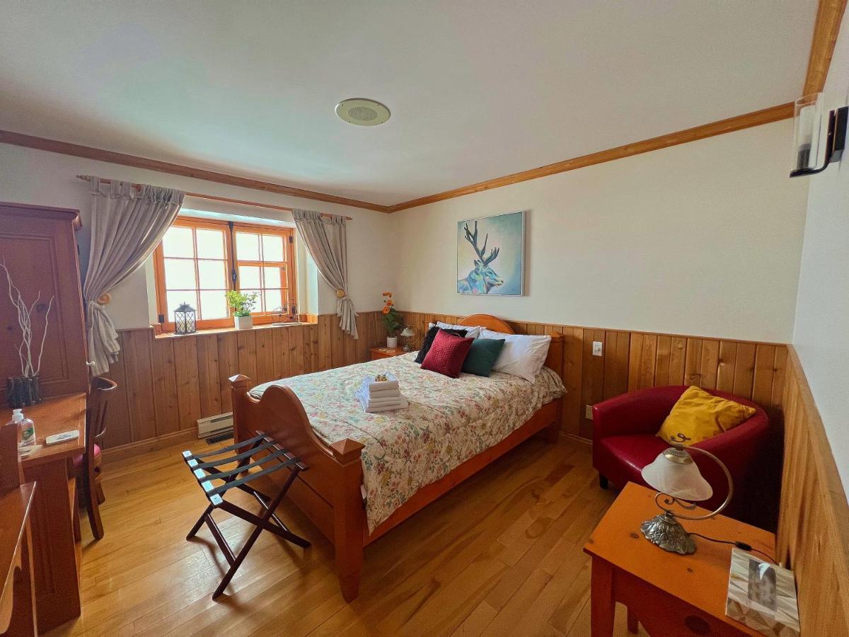 Auberge Au Poste De Traite Sainte-Famille Экстерьер фото